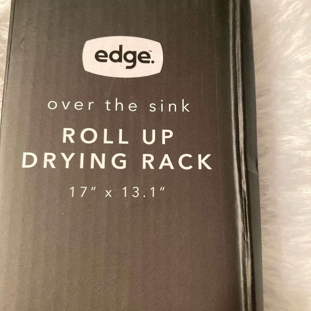 NWTs.  Grey Roll-Up Over-Sink Drying Rack